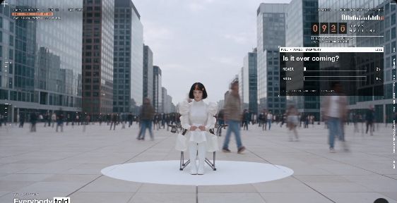 Claudia sits in a white outfit in a plaza between tall buildings, with designed interface graphics
