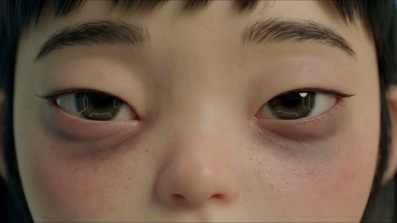 Close-up of Alice’s face with geometric reflections in her eyes